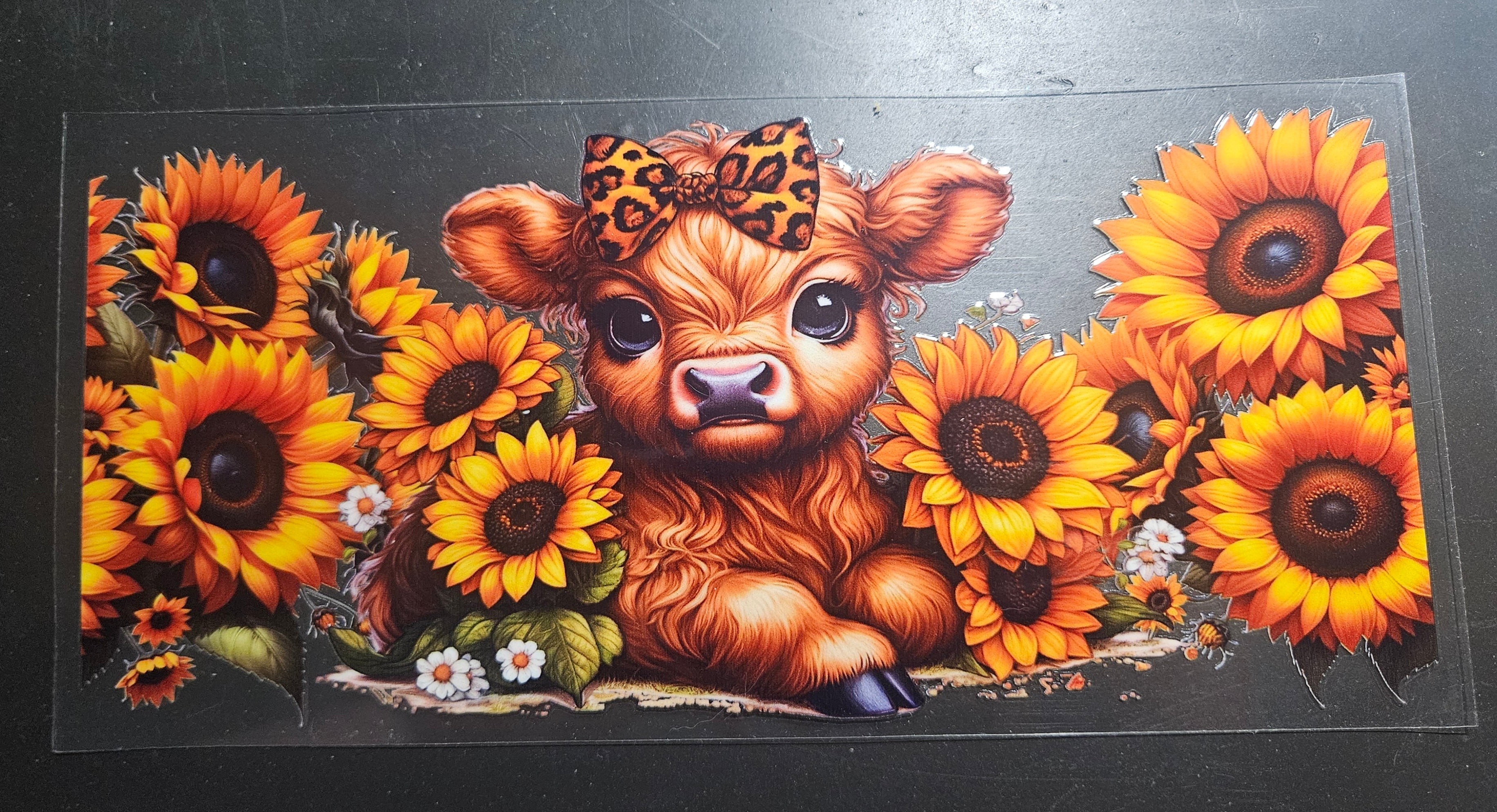 Cow and sunflowers
